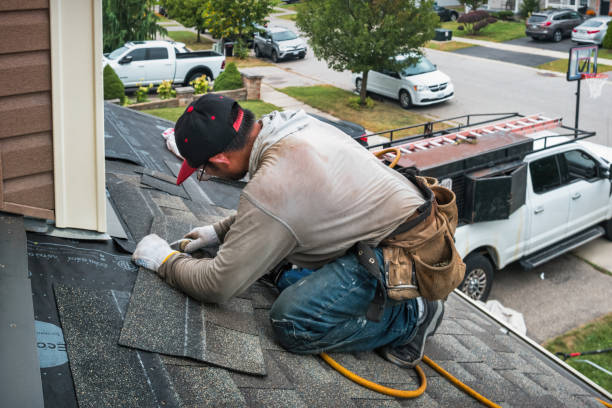 Professional Roofing technician working in Traverse City, MI